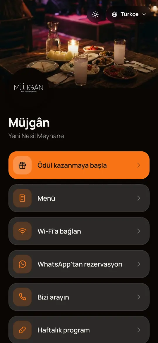 Müjgân eğlence mekânının kartı: koyu tema, turuncu vurgu